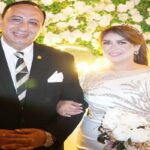 اللواء طارق عبدالباعث والإعلامية منال فاروق