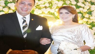 اللواء طارق عبدالباعث والإعلامية منال فاروق