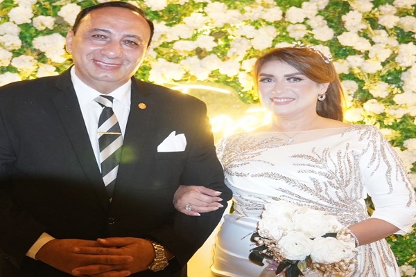اللواء طارق عبدالباعث والإعلامية منال فاروق