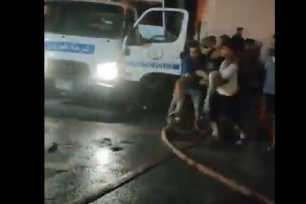 نقل المصابين في حريق مديرية أمن الإسماعيلية