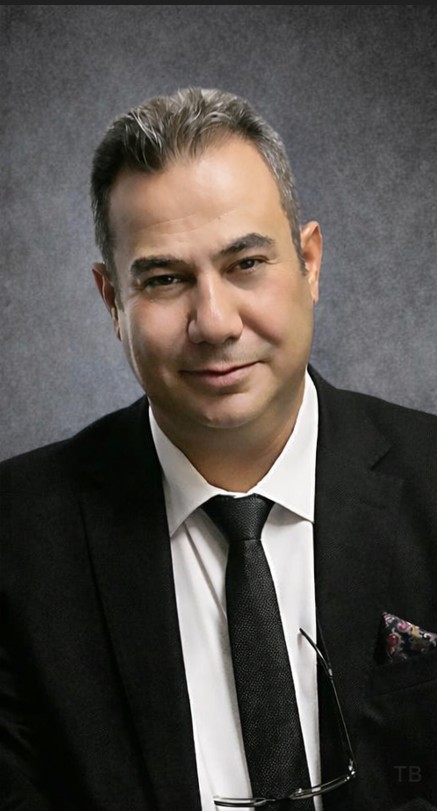 الكاتب التركى الصحفى تحسين بابات